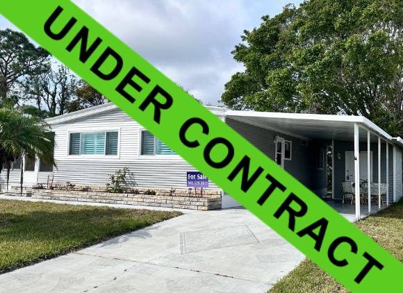 Ellenton, FL Mobile Home for Sale located at 7216 Lakeshore Dr Colony Cove